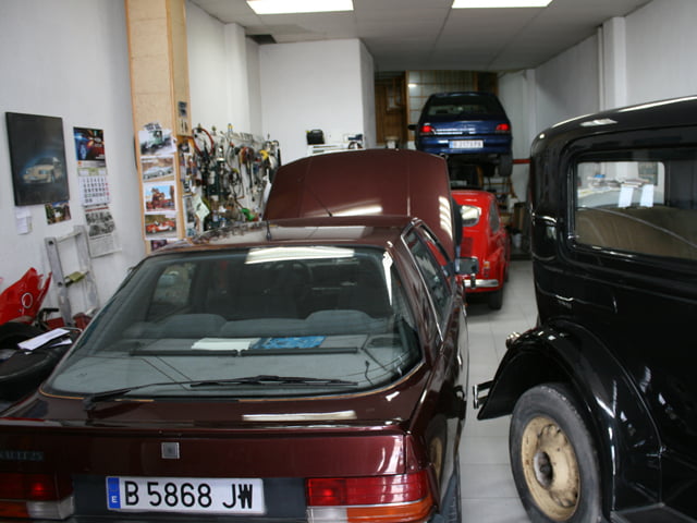 Old Renaults in garage