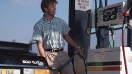 Man with Saab 900 at petrol station