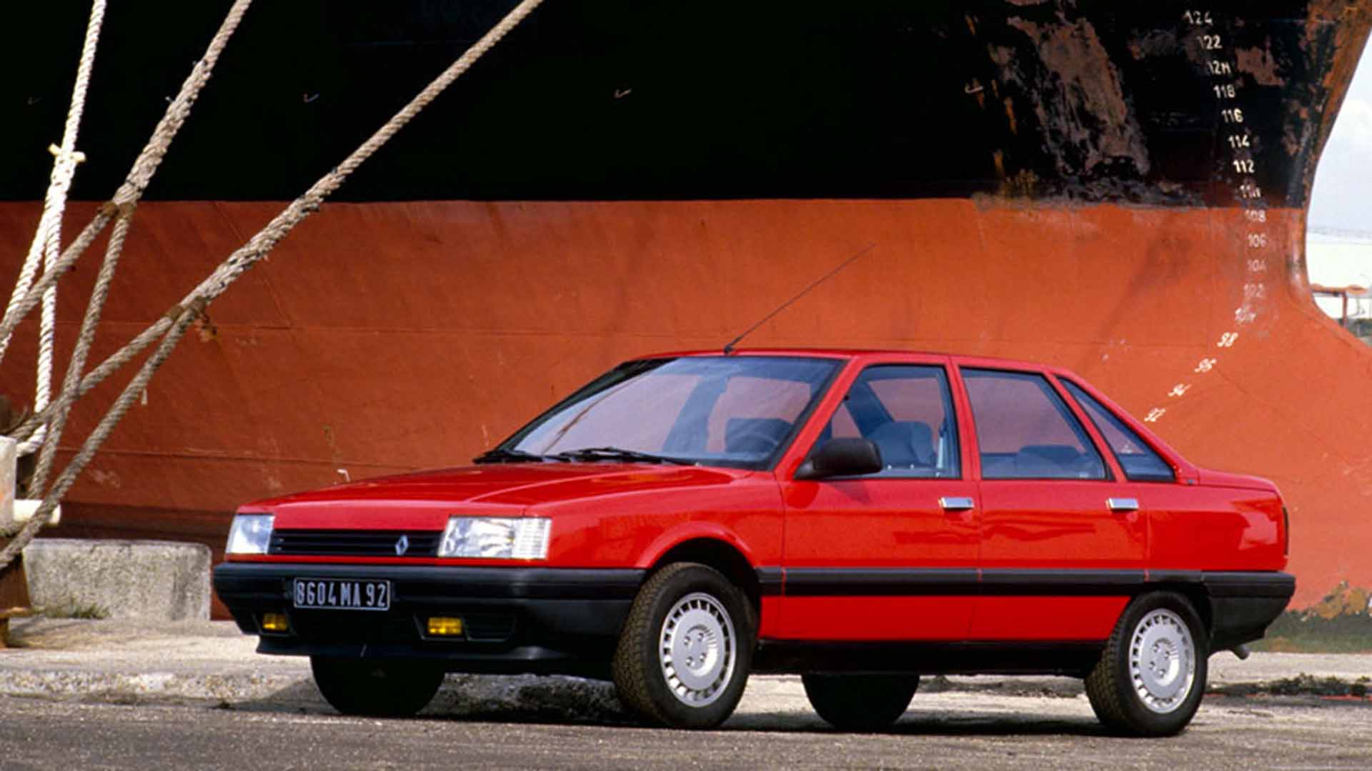 Renault 21 next to ship