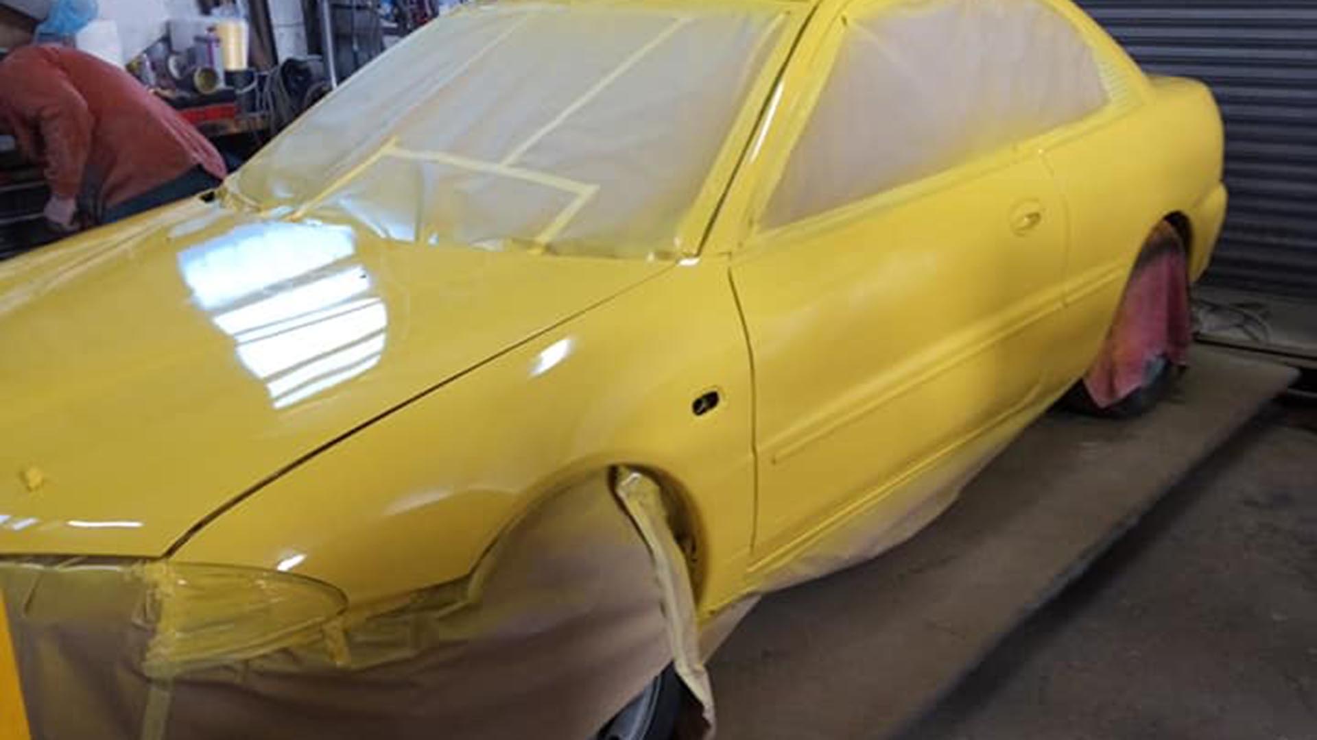 Proton Coupe Yellow