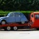Citroen 2CV resting on the back of a truck